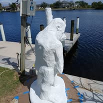 Large statue primed white before finishing coats