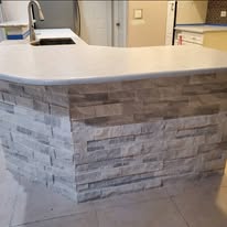Stacked stone bar counter finished by AMG Painting