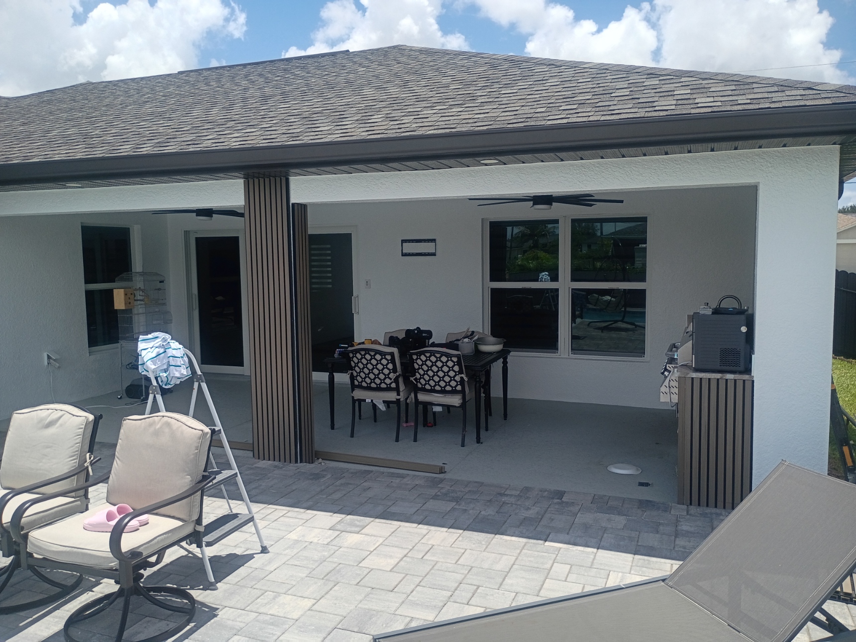 Covered lanai and paver patio after fresh paint